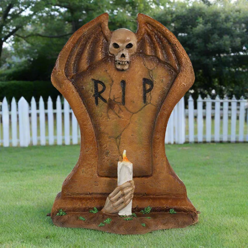 Gravestone with a Candle