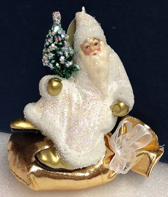 Santa with Tree on gold sack, Paper Mache Ornament, white beaded and glittered, by Ino Schaller