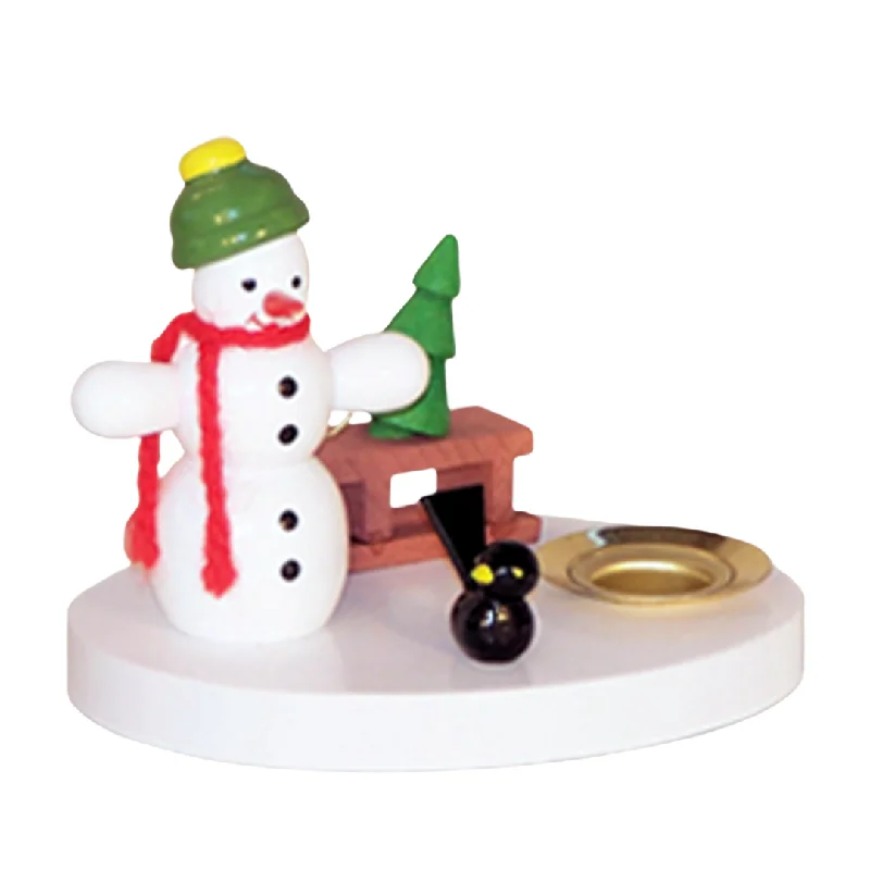 Snowman with sled candleholder by Volker Zenker